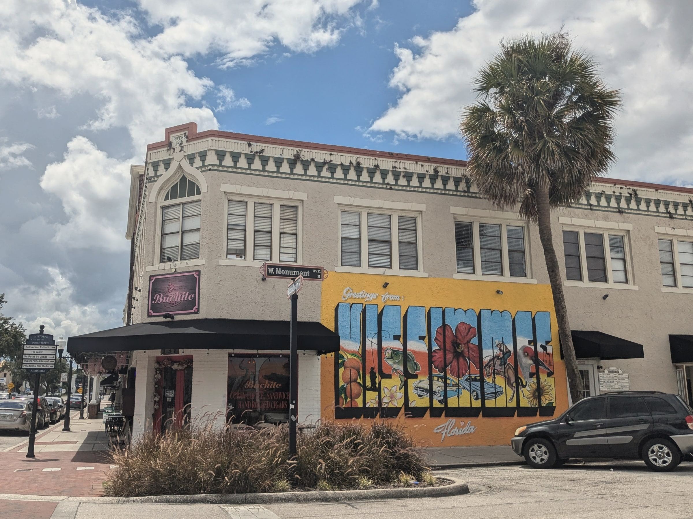 The Rivers Building on Broadway in downtown Kissimmee, with a large Kissimmee mural